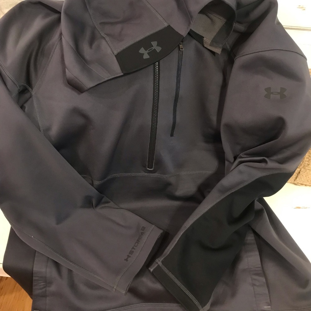Under Armor hooded pull over. Water resistant
